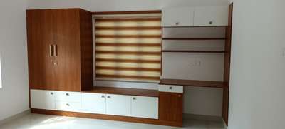 Storage Designs by Building Supplies Unison Interiors, Kottayam | Kolo