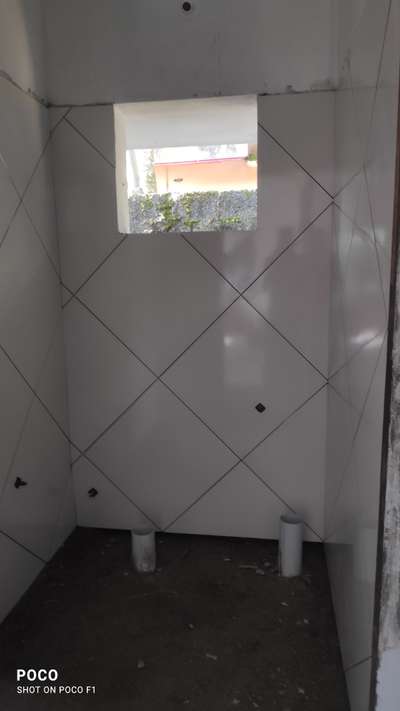 Bathroom, Wall Designs by Flooring Sunilsiva Sunilsiva, Thiruvananthapuram | Kolo