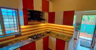 Kitchen, Lighting, Storage Designs by Contractor Anandhan achari, Kollam | Kolo