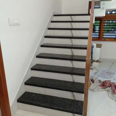 Door, Staircase Designs by Flooring prajeesh  kuzhippalli, Kozhikode | Kolo