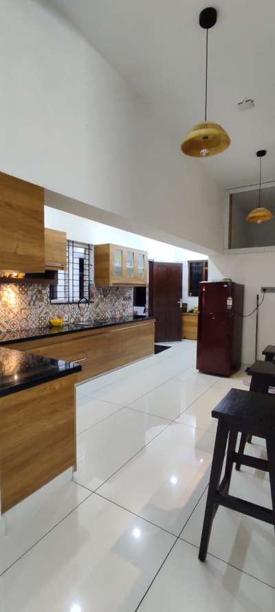 Kitchen, Lighting, Flooring, Storage Designs by Interior Designer Biju Xavier Jacob Jacob, Thrissur | Kolo