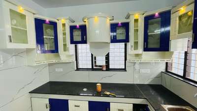 Kitchen, Lighting, Storage Designs by Contractor Vineeth Vijayan N, Thiruvananthapuram | Kolo