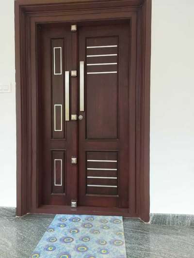 Door Designs by Carpenter Sasimon Ck CK wood industry , Malappuram | Kolo