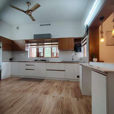 Kitchen, Storage Designs by Contractor shuffle interiors, Ernakulam | Kolo