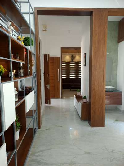 Storage Designs by Civil Engineer Homeliness  builders  interiors, Malappuram | Kolo