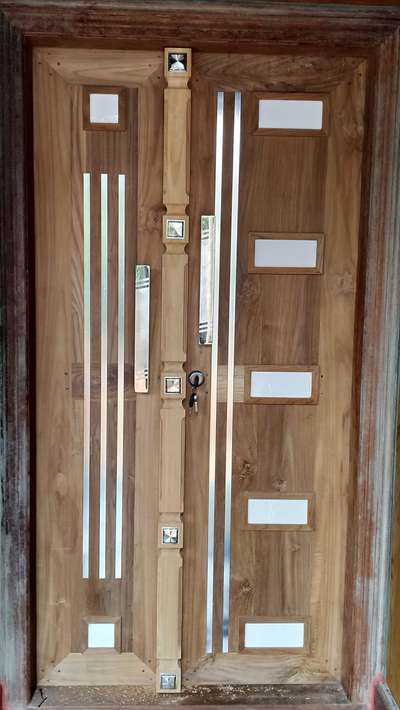 Door Designs by Carpenter Binesh vasudev, Malappuram | Kolo