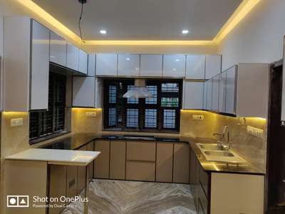 Kitchen, Lighting, Storage Designs by Interior Designer SULTHAN KV, Malappuram | Kolo