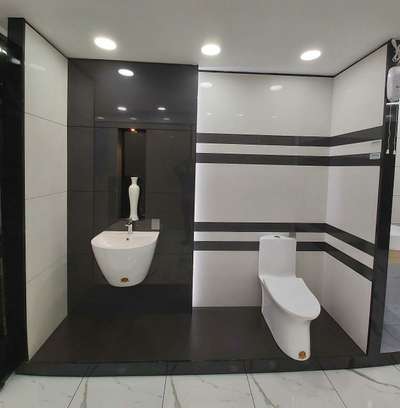 Bathroom Designs by Flooring limesh  limesh , Thrissur | Kolo