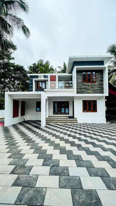 Exterior, Flooring Designs by Contractor വീട് ഒരു സ്വപ്നം , Kozhikode | Kolo