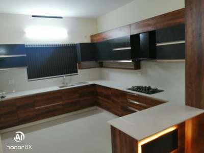 Kitchen, Lighting, Storage Designs by Interior Designer Manoj Das, Thiruvananthapuram | Kolo