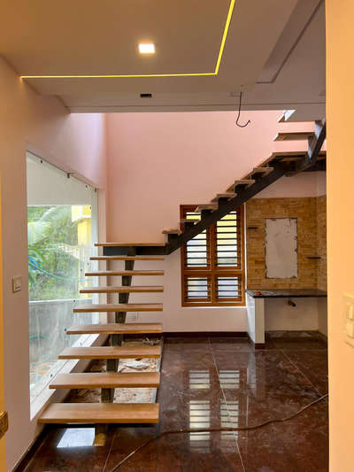 Ceiling, Staircase, Flooring, Window, Storage Designs by Architect Jamsheer K K, Kozhikode | Kolo