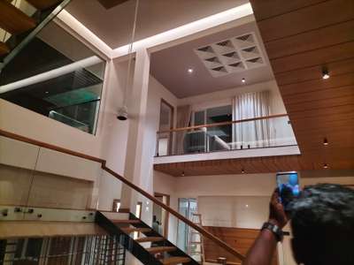 Ceiling, Lighting, Staircase Designs by Contractor focusive bulders  developers , Kottayam | Kolo