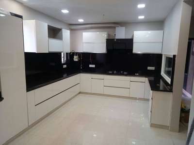 Kitchen, Lighting, Storage Designs by Interior Designer Smart tech yuva Constructions PVT LTD, Delhi | Kolo