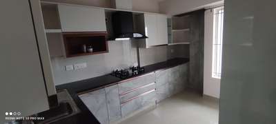 Kitchen, Storage Designs by Interior Designer Surya Kumar, Thiruvananthapuram | Kolo