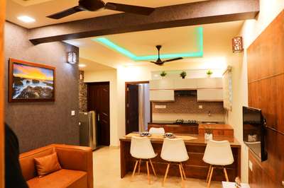Kitchen, Lighting, Furniture, Storage Designs by Interior Designer Rajesh Kumar, Thiruvananthapuram | Kolo