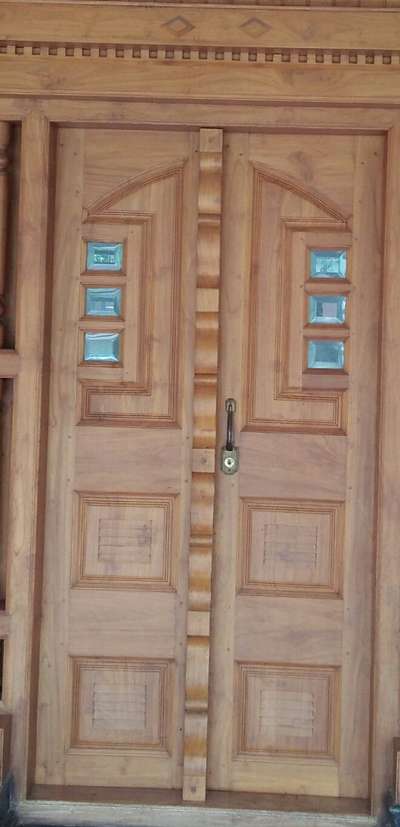 Door Designs by Carpenter Haridas Mannur, Kannur | Kolo