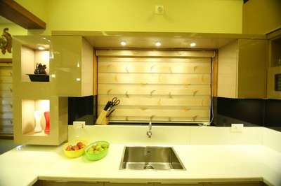 Kitchen, Lighting, Storage Designs by Interior Designer Pradeep Kumar CivvieS, Kannur | Kolo