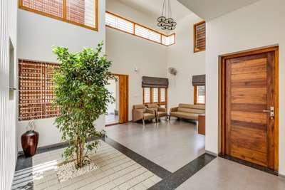 Door, Flooring, Furniture, Living Designs by Architect Aleena Mariyam , Kottayam | Kolo
