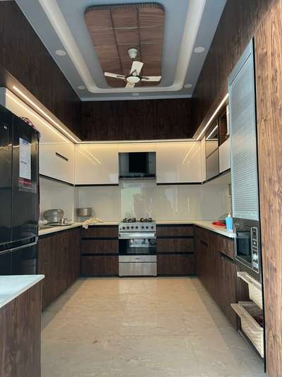 Kitchen, Lighting, Storage, Flooring Designs by Contractor Navi interior interiors, Delhi | Kolo