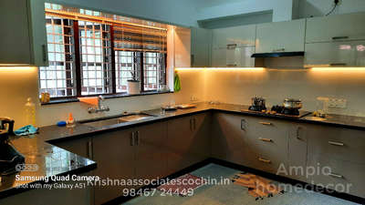 Kitchen, Lighting, Storage Designs by Interior Designer Krishna Associates Ampio homedecor , Ernakulam | Kolo