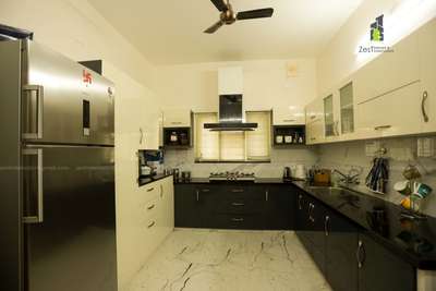 Kitchen, Storage, Flooring Designs by Interior Designer Binu Alappadan, Thrissur | Kolo