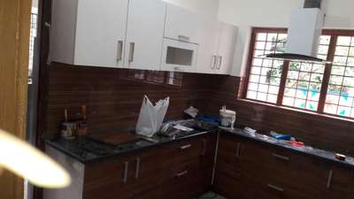 Kitchen Designs by Interior Designer Rajeshck Rajesh, Thrissur | Kolo