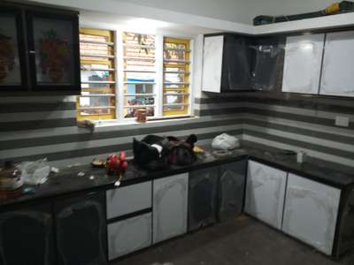 Kitchen, Storage Designs by Interior Designer Loujikunnath Kv, Wayanad | Kolo