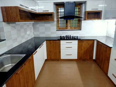 Kitchen, Storage Designs by Interior Designer jibin cyriac, Kottayam | Kolo