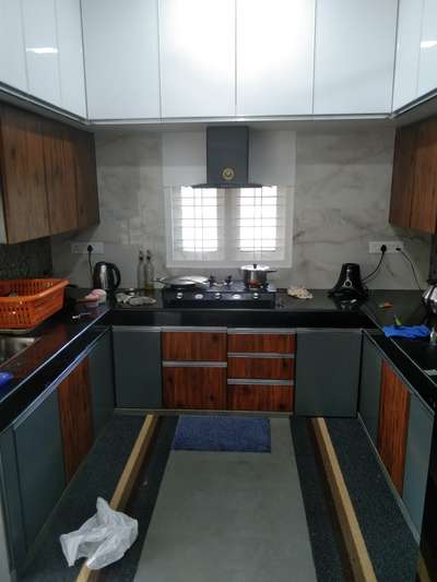 Flooring, Kitchen, Storage Designs by Interior Designer Gokul chandran, Ernakulam | Kolo