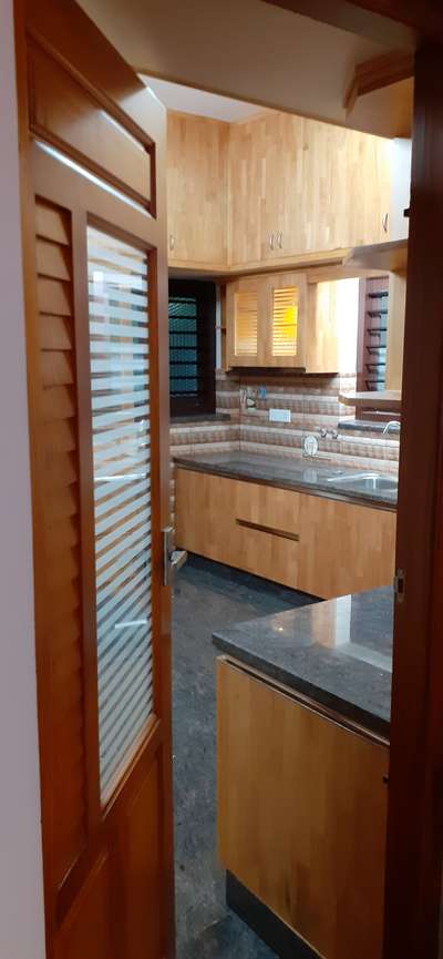 Kitchen, Storage Designs by Contractor Ganesh Kumar, Thiruvananthapuram | Kolo