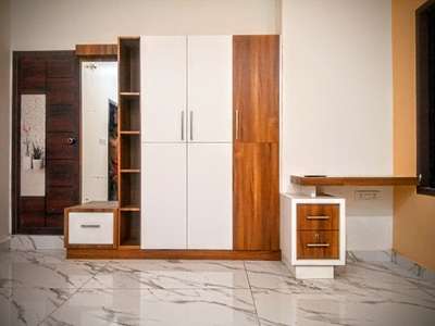 Storage Designs by Interior Designer Jithesh Lal, Malappuram | Kolo