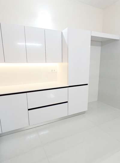 Kitchen, Lighting, Storage Designs by Interior Designer CABINET stories 9495011585, Thrissur | Kolo
