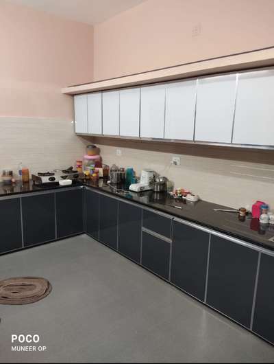 Kitchen, Storage, Flooring Designs by Interior Designer Mansoor Ali, Kozhikode | Kolo