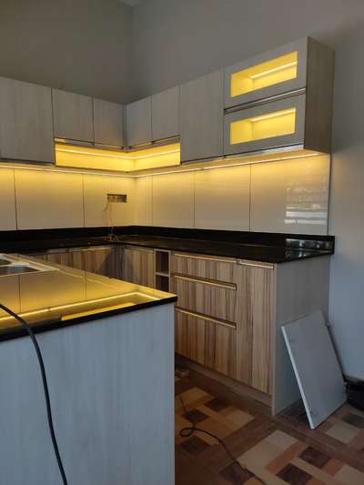 Kitchen, Lighting, Storage Designs by Interior Designer Santhosh Unni, Kannur | Kolo