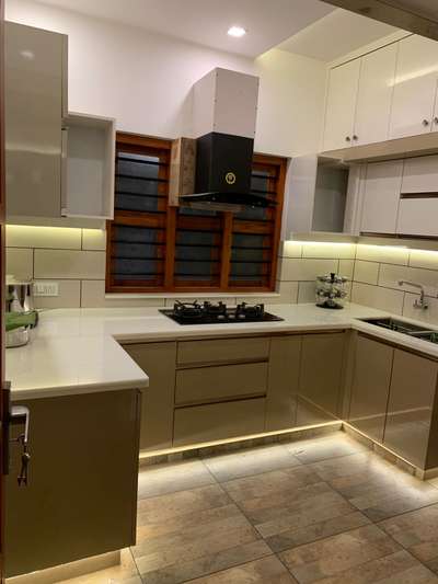 Kitchen, Lighting, Storage Designs by Contractor Cadillac  interiors, Kozhikode | Kolo